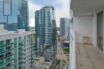 a view of a city from the balcony of a building at Gorgeous Apartment in Brickell in Miami