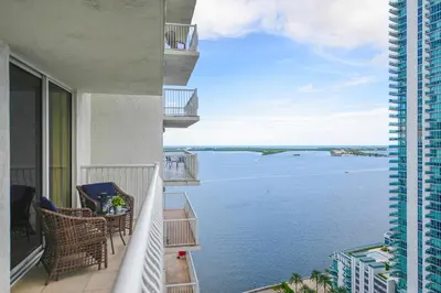 a balcony with a view of a body of water at Gorgeous Apartment in Brickell in Miami