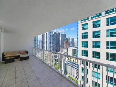 a balcony with a view of a city skyline at Gorgeous Apartment in Brickell in Miami