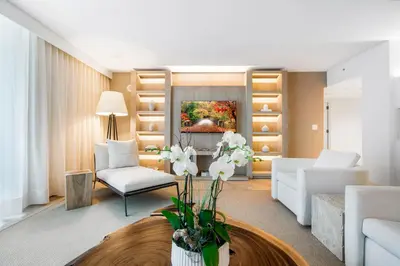 a living room with a couch and a table at Oceanview Private Condo at 1 Hotel & Homes -1115 in Miami Beach