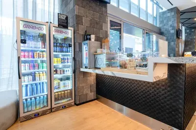 a grocery store with two refrigerators and drinks at YOTEL Miami in Miami