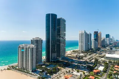 an aerial view of a city and the ocean at Sunny Isles 1BDR Sea View and Pool in Miami Beach