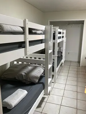 two sets of bunk beds in a room at Single Size TOP Bunk Bed - Mixed Shared ROOM in Miami