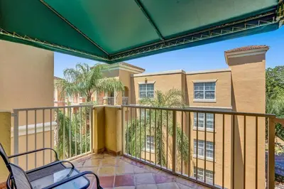 a balcony with a view of a building at Renovated cozy The yacht club at aventura Parking included in Miami