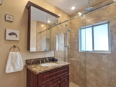 a bathroom with a sink and a shower at Surf House - Paddleboards - Canoes -1 mile to Wilton Manors in Fort Lauderdale
