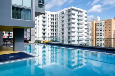 a swimming pool on the roof of a building at Atwell Suites Miami Brickell by IHG in Miami