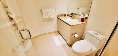 a small bathroom with a toilet and a sink at Dramatic Ocean View at Hyde Resort And Residences in Hollywood