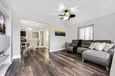 a living room with a couch and a table at Home wworkstation by PMI unit 2908 in Hollywood