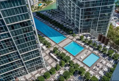 an aerial view of a building with two pools at *ICONIC W ICON CONDO/ POOL&WATERVIEWS*FREESPA* in Miami