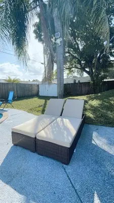 a bed sitting on the ground on a sidewalk at Pool Home in Hollywood