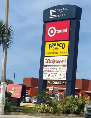 a sign in front of a store at Cozy Private House near Miami Airport - Free parking - 01 in Miami