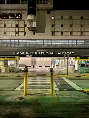 a sign for aiman international air port in front of a building at Pretty Private Room, near the Airport - Free parking - 01 in Miami