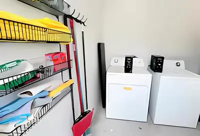 a refrigerator and a washing machine in a room at Gorgeous Private Room, near the Airport - Free parking - 01 in Miami