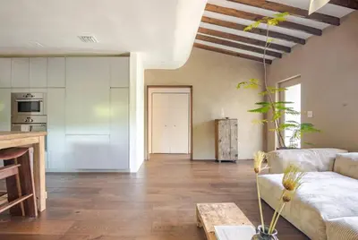 a living room with a couch and a table at Casa Ishi - at lumicollection in Miami