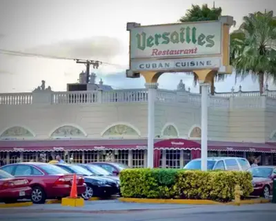 a car dealership with cars parked in a parking lot at Cozy Private Room, near the Airport - Free parking - 01 in Miami