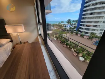 a hotel room with a view of a balcony at Deluxe Beach Resort - HORA RENTALS in Miami Beach
