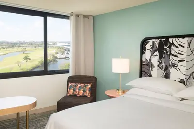 a hotel room with a bed and a window at Sheraton Miami Airport Hotel and Executive Meeting Center in Miami