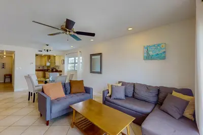 a living room with a couch and a table at Samira's South Beach Paradise in Miami Beach