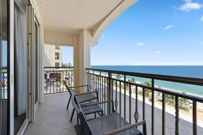 a balcony with chairs and a view of the ocean at The Atlantic Hotel & Spa in Fort Lauderdale
