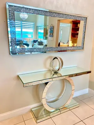 a bathroom with a mirror and a toilet at Large luxurious direct ocean front Penthouse or Deluxe 1 BR ocean front condo-Beach access- Free parking- Remodeled in Miami Beach