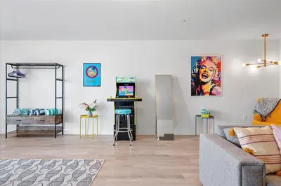 a living room with a couch and a table at Lofts of Aventura in Miami