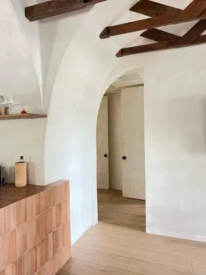 an empty room with an archway in a building at Casa Terra Lumi - at lumicollection in Fort Lauderdale
