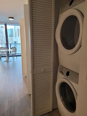 a laundry room with a washer and dryer at Lovely Condo Unit in Miami