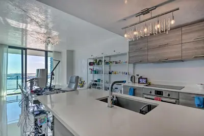 a kitchen with a sink and a counter top at Luxe Miami Condo with Community Pool and Hot Tub! in Miami