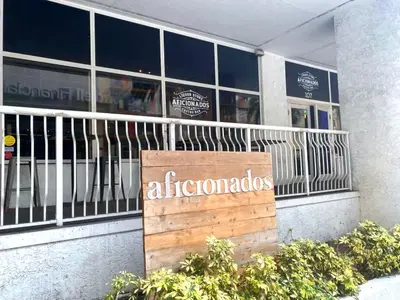 a sign in front of a store at Trendy 2BR Condo with Pool and Bay Views in Miami