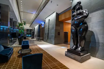 a statue in the lobby of a building at 2 Bedroom OR King Studio Suites Four Seasons Hotel Miami Free Wi-Fi & Free Parking in Miami