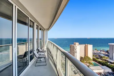 a balcony of a building with a view of the ocean at WVR Vacation Residences 1707 in Fort Lauderdale