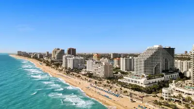 an aerial view of a beach with buildings and the ocean at WVR Vacation Residences 1707 in Fort Lauderdale