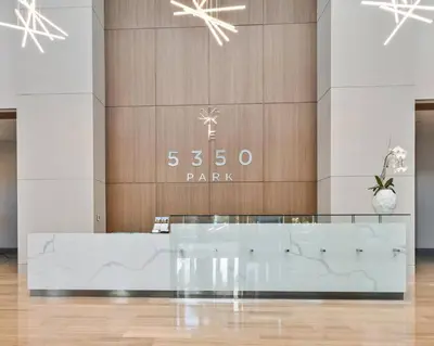 a lobby with a glass counter in a building at Luxury Studio Apartment in Downtown Doral in Miami