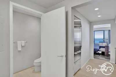 a bathroom with a toilet and a view of the ocean at 1BR condo w hot tub gym access in Fort Lauderdale