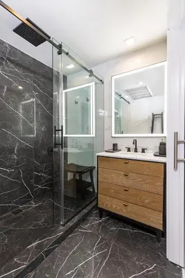 a bathroom with a shower and a sink at Boutique Suite with Huge Terrace and Rooftop Pool in Miami Beach