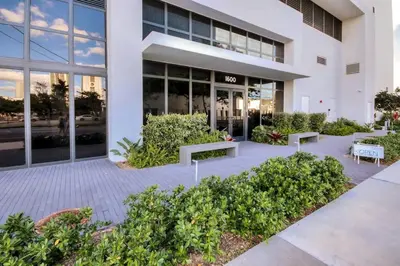a building with benches in front of it at Lunabase Heavenly View in Miami