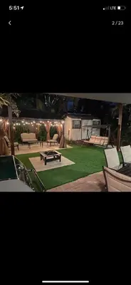 a picture of a park with a bench and a table at Cozy House in Fort Lauderdale