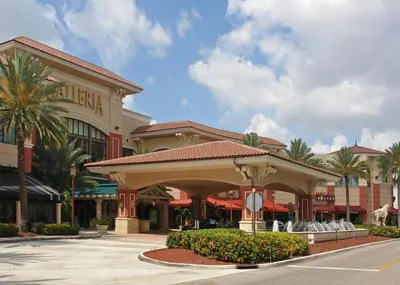 a hotel with a pavilion in front of a building at Avi Lux Stay in Fort Lauderdale