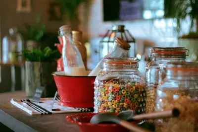 a counter with jars filled with different types of seeds at Hotel Gaythering - Gay Hotel - All Adults Welcome in Miami Beach