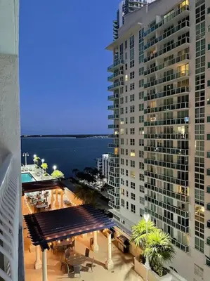 a view of a tall building with a large building at Rooftop Pool with Water View in Miami