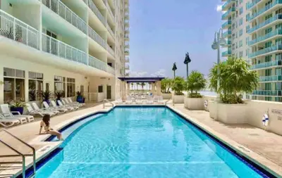 a swimming pool in the middle of a building at Luxurious Condo with PARKING in Brickell Miami in Miami