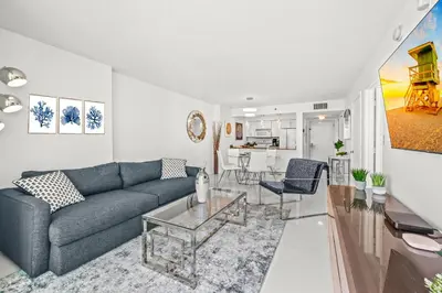 a living room with a couch and a table at Luxurious Condo with PARKING in Brickell Miami in Miami