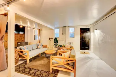 a living room with a couch and a table at Casa Del Sol in Hollywood