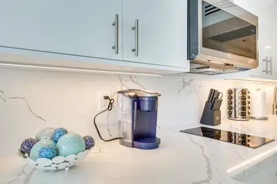 a kitchen counter with eggs in a bowl and a blender at Sunny Isles Beach Retreat with Resort Perks! in Miami Beach