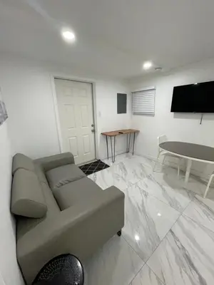 a living room with a couch and a table at Downtown FTL apartments on the River in Fort Lauderdale