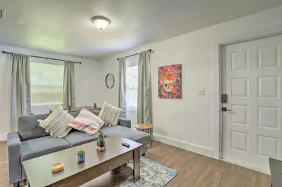 a living room with a couch and a table at Beautiful Miami Getaway Less Than 6 Mi to Downtown! in Miami