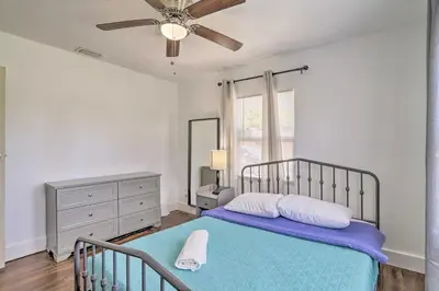 a bedroom with a bed and a ceiling fan at Beautiful Miami Getaway Less Than 6 Mi to Downtown! in Miami