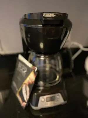 a coffee pot sitting on top of a table at Four Seasons Hotel Miami - Luxury Private Residences in Miami