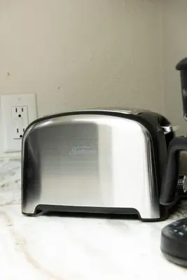 a toaster oven sitting on top of a counter at The Hideaway at Lake Ridge 2 in Fort Lauderdale