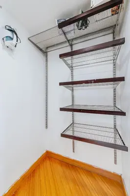 a room with metal shelves on the wall at Amazing 2 BR APT at Brickell, Free Parking in Miami